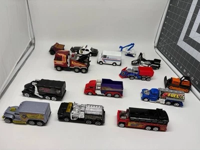 Hot Wheels Mixed Lot of 14 – Rigs, Tanker, Tow Truck, USPS, Police Car, etc - Image 1 of 4