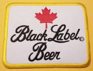 Kanadisches schwarzes Etikett Bier neu besticktes Aufnäher weltweit ca. "2,75 x 3,5" - Bild 1 von 2