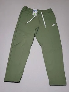 Nike Pantalone Gamba Conica Tessuto Verde DX0623-386 Uomo Medium Nuovo - Foto 1 di 6