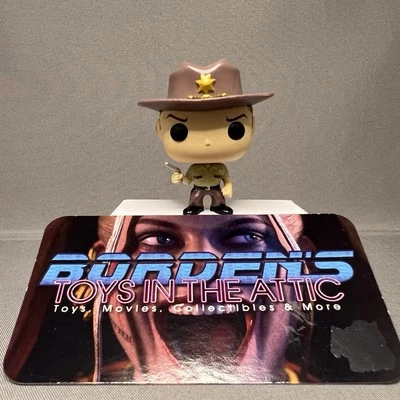 Figura Rick Grimes 2015 Funko Mini Pocket Pop (sin llavero) The Walking Dead Foto 1 de 4