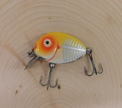 Señuelo de pesca vintage Heddon Tiny Punkinseed, colores amarillos Shore Minnow Foto 1 de 4