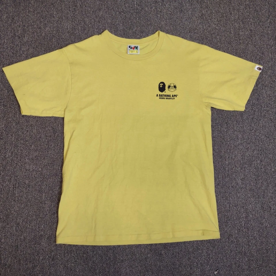 Camiseta amarilla para hombre A Bathing Ape Bape SS18 Hebru Brantley Flyboy Baby Milo #6 L Foto 1 de 4