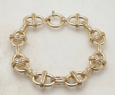 Brazalete Technibond Ovalado Pulido Corte Diamante Chapado en Oro Amarillo 14K Plata 925 Foto 1 de 4