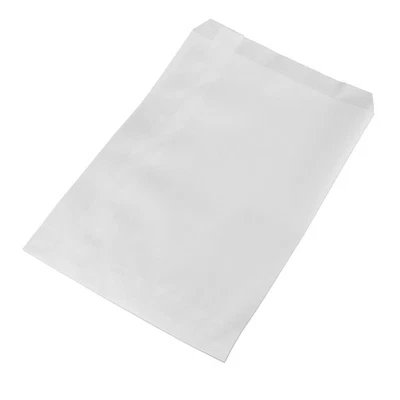 Bolsas pequeñas de mercancía de papel Kraft blanco SSWBasics 61/4” de ancho x 91/4” de alto, estuche de 1000 Foto 1 de 2