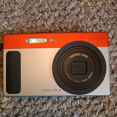 Pentax Optio H90 Compact Digital Camera 12.1MP 5x Zoom Orange TESTED WORKING - Image 1 of 4