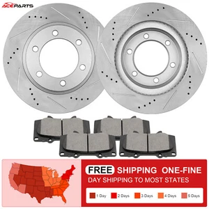 FRONT DRILL ROTORS CERAMIC PADS FOR 2005 - 2013 2014 TOYOTA TACOMA FJ CRUISER US - Picture 1 of 8