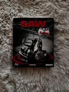 SAW - 10 Jahre SAW auf 7 Bluray Disc ( 7 Filme ) Neuwertig  - Bild 1 von 8