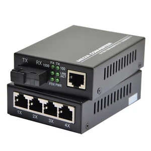10/100/1000Mbps Single Mode 1&4 RJ45 Ethernet to Fiber Optic Media Converter - Picture 1 of 9