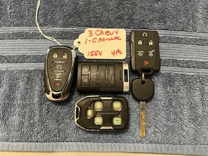 Remote Key Fobs 4 Pc 3 Chevy (1 missing button cover) 1 Cadillac Inv 1554 - Picture 1 of 2