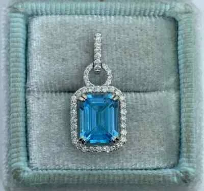3Ct Emerald Cut Lab-Created Blue Topaz Halo Pendant 14K White Gold Silver Plated - Image 1 of 4