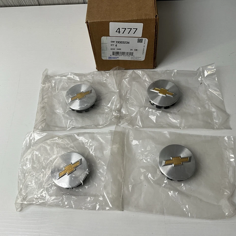 Nova tampa central de roda GM fabricante de equipamento original com gravata borboleta dourada 19303234 Sonic 13-15 Cruze 18-19 - Imagem 1 de 4