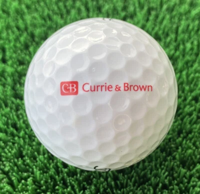 Pelota de golf Titleist NXT Tour Currie y logotipo marrón publicidad PGA Foto 1 de 4