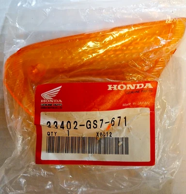 HONDA ELITE 50 SCOOTER OEM R/H FRT TURN SIGNAL LENS 33402-GS7-671 NOS   E-1 - Image 1 of 4