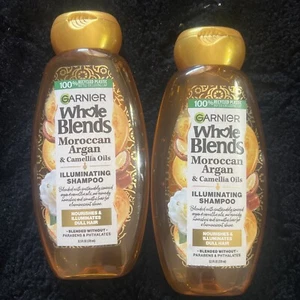 2 Stück Garnier ganze Mischungen Illuminating Shampoo mit marokkanischen Argan- & Kamelienölen - Bild 1 von 2