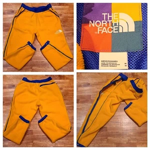 Pantalones de chándal The North Face Colorblock polar con cremallera lateral para hombre talla mediana amarilla - Imagen 1 de 14