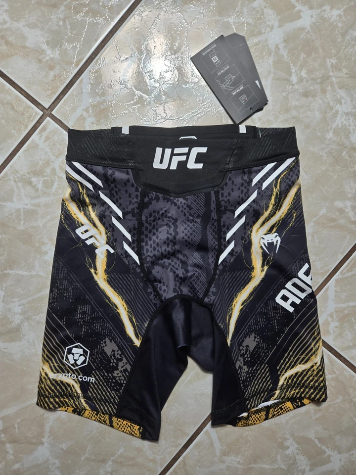 Nuevo con etiquetas Auténticos Pantalones Cortos Venum UFC Israel Adasanya Fight Night Vale Tudo Para Hombres S $130 Foto 1 de 4