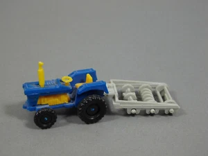 AUTOS: Traktoren D 1982/83 - Traktor mit Fräse blau/grau - Bild 1 von 1