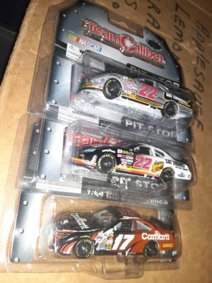 1/64 2006  22 17 Carhartt  Caterpillar Team Caliber Pit Stop Lot X3 - Image 1 of 2