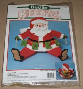 1990 Bucilla "Jolly Santa" w/ Toys Christmas Centerpiece Plastic Canvas Kit NIP - Picture 1 of 2