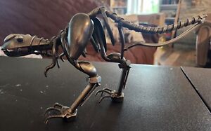 Metal T Rex~Dinosaur welded sculpture, industrial art~6"x11.5"~scrap~screws~etc.
