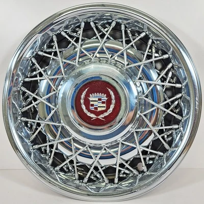 Uno Cadillac Fleetwood Brougham 1986-1987 tracción trasera # 2049A tapacubos de cable de 15" # 01637249 Foto 1 de 4