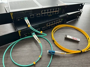 HP Enterprise Aruba 6000 R8N89A PoE 12G 2G/2SFP Managed+SFP Module & Fibre Cable - Picture 1 of 7