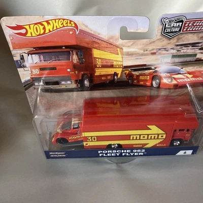 Hot Wheels Premium Team Transport Porsche 962/Fleet Flyer Momo- 1:64 Diecast Car - Image 1 of 4