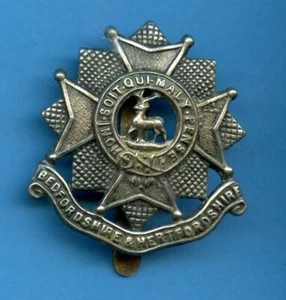 THE  BEDFORDSHIRE & HEREFORDSHIRE REGIMENT  CAP BADGE - Picture 1 of 2