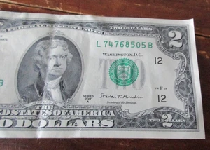 BANCONOTA 2 DOLLARI BUON COMPLEANNO AMERICA 2017A - L74768505A - RARA - circolata - Foto 1 di 2
