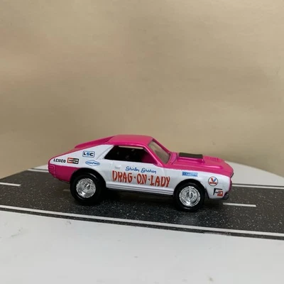 Johnny Lightning Dragsters EE. UU. '69 AMC Javelin AMX Drag-On Lady Blanco/Rosa 1:64  Foto 1 de 4