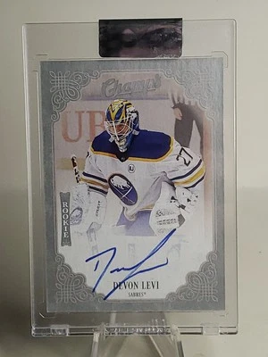 2023-24 Upper Deck Clear Cut Champs Rookies Devon Levi Sabres Rookie Auto RC - Image 1 of 3