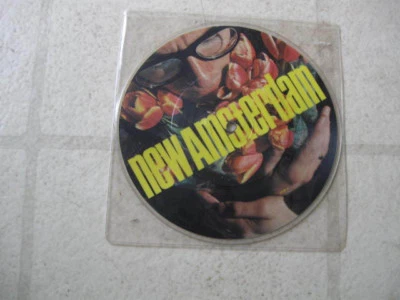 ELVIS COSTELLO 1980 'new amsterdam' 4-TRK UK 7" PIC DISC NEW/MINTY FRESH wNON LP - Image 1 of 2