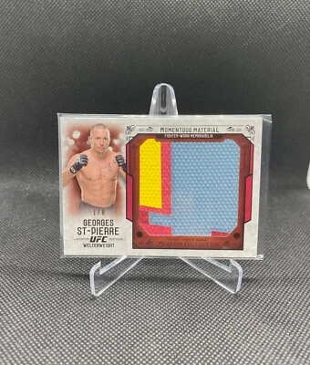 2015 Topps UFC Knockout Georges St-Pierre Momentous Material Relic Ruby Red #/8 - Image 1 of 2