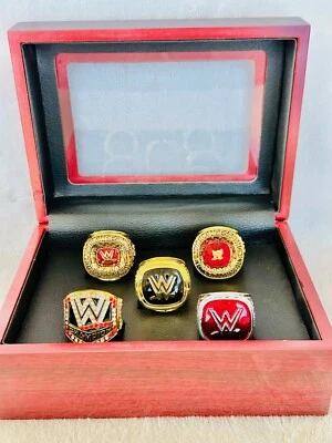 Juego de 5 anillos de campeonato del Salón de la Fama de la Lucha Mundial de la WWE con caja, envío a EE. UU. Foto 1 de 4
