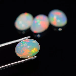 OPAL Etíope Ovalado Cabujón Piedra Preciosa Suelta 6X8 mm 3.00 Cts Welo Fuego Pes 4 - Imagen 1 de 3