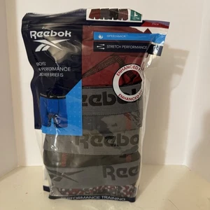 Paquete de 4 calzoncillos boxer Reebok para niños ropa interior talla grande 12/14 nuevo paquete abierto - Imagen 1 de 5