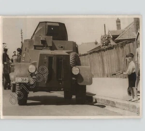 Artistic WWII Era Press Photo CHILD w TOY GUN Faces MILITARY TANK on Street 1940 - Picture 1 of 2