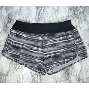 Nike Pantaloncini Donna Med Nero Rigato Running Dri-Fit Active Gym Coulisse 4" - Foto 1 di 7