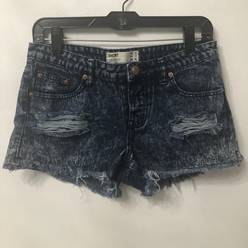 Pantalones cortos informales de jean de algodón para mujer talla 4 azules desgastados con dobladillo crudo Foto 1 de 4