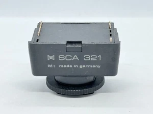 Adaptador de zapata METZ SCA-321 (M1) para unidades de flash para cámaras fotográficas Olympus OM - Imagen 1 de 4