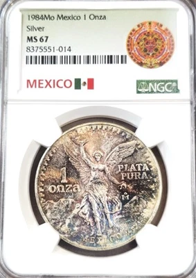 1984 MEXICO SILVER LIBERTAD 1 ONZA-NGC MS 67-ABSOLUTELY WILD COLOR TONING - Image 1 of 3