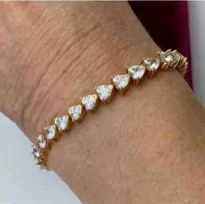 Brazalete de tenis para mujer de diamantes creados en laboratorio con corte de corazón de 9 quilates enchapado en oro amarillo de 14 quilates Foto 1 de 4