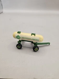 ERTL John Deere 1/64 Anhydrous Ammonia Tank Trailer with Yellow Rims - Picture 1 of 3
