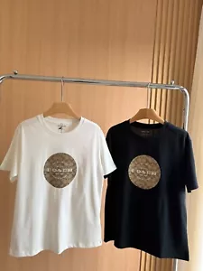 NUEVO CON ETIQUETAS COACH Hombre Mujer Unisex Blanco Negro Camiseta ALGODÓN Redonda - Imagen 1 de 7