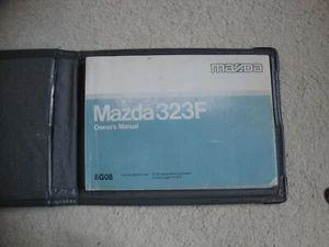 MAZDA 323F Handbook. and Wallet - Picture 1 of 4