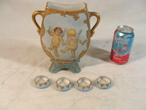 Jarrón antiguo de querubines de porcelana Limoges y 4 sales - Imagen 1 de 7