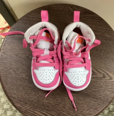 Infant "Nike" pink and white lace up sneakers. Size Infant 4.5          P .O. - Image 1 of 3