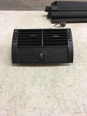 BMW X5 2003 CONSOLA CENTRAL VENTILACIÓN AIRE TRASERA TV AV ENCENDEDOR DE CIGARRILLOS AIRE ACONDICIONADO CALOR MEDIO Foto 1 de 3