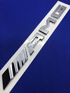 MERCEDES AMG Chrome LOGO GENUINE A2228170415 NEW - Picture 1 of 4