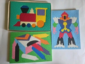 3 Vintage Lauri Krepp Schaumstoff Puzzle: Zug, Roboter, Schachtel mit Buntstiften  - Bild 1 von 4